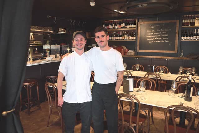 Chef Gustavo Benet and general manager Ander Mendive Barcos prepare to open the new private dining room at Gambas