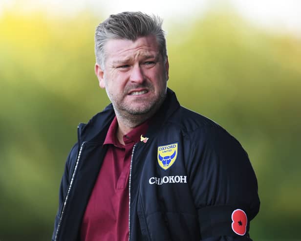 Karl Robinson is considered a leading figure for the Bristol Rovers job. (Photo by Alex Burstow/Getty Images)