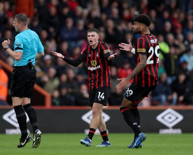 BOURNEMOUTH, ENGLAND - OCTOBER 28: Alex Scott and Philip Billing of AFC Bournemouth react towards Referee Sam Barrott during the Premier League match between AFC Bournemouth and Burnley FC at Vitality Stadium on October 28, 2023 in Bournemouth, England. (Photo by Eddie Keogh/Getty Images)