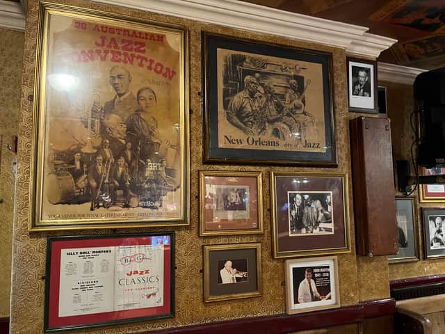 The pub walls and ceiling are plastered with jazz posters and photos