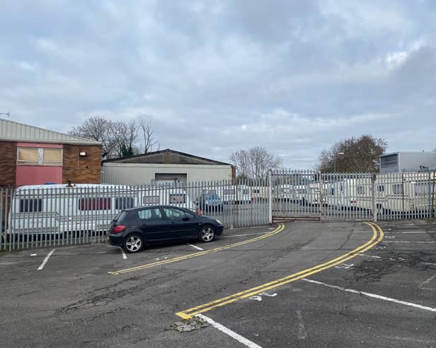 A group of Travellers have moved onto a former car showroom site in south Bristol