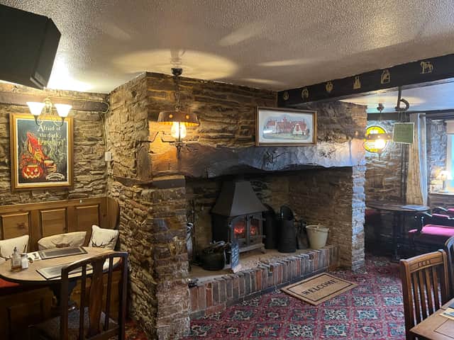 The cosy fire in the front room of The New Inn