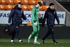 Dan Grimshaw was substituted off by Blackpool on Wednesday. He is 'touch and go' for their clash with Bristol Roves. (Image: Getty Images)