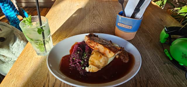 chargrilled pork chop, spring onion mash, spiced red cabbage, apple chutney and red wine