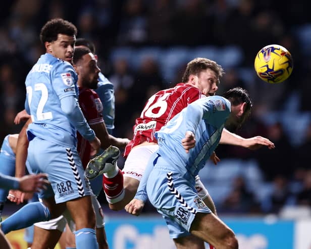 Rob Dickie heads Bristol City level against Coventry