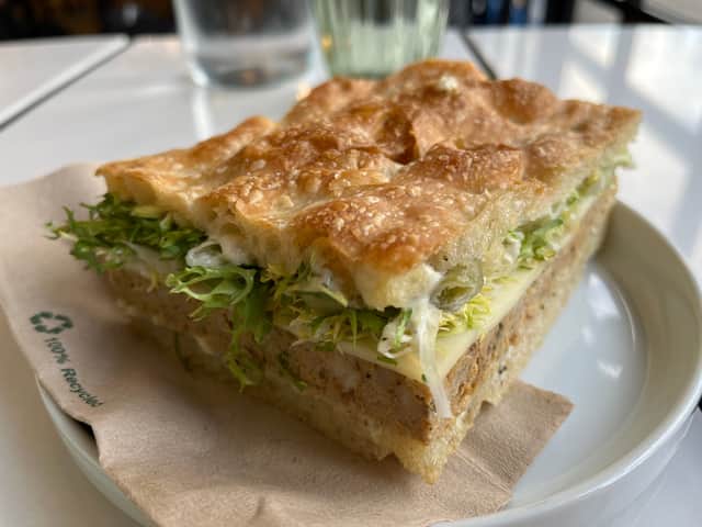 Focaccia filled with meatloaf, scamorza, peppercorn mayo, frisée and pickled chilli