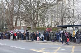 A huge queue outside St Pauls Dental Practice where people hope to register for NHS dental care
