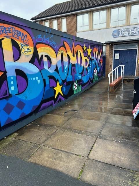 One of the colourful murals outside Broadbury Road police station