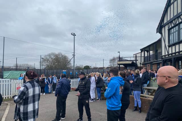 Blue confetti was released outside in memory of Max