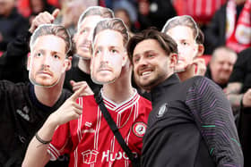 Bristol City supporters wore Harry Cornick masks for their game against Stoke City. The Robins' final position in the Championship away attendance table has been revealed. (Photo by Charlotte Tattersall/Getty Images)
