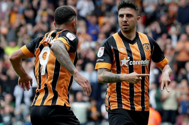 Hull City's Ozan Tufan (right) celebrates with team mate Allahyar Sayyadmanesh after he equalised from the penalty spot  (Picture: Richard Sellers/PA)