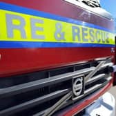 One woman was rescued by fire crews