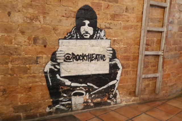 A Banksy tribute mural inside Rock the Atic, a late night bar and comedy club in Butcher's Row of Banbury's town centre