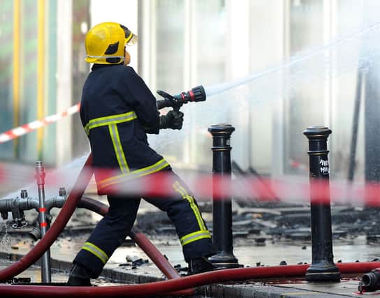 Undated file photo of a firefighters tackling a blaze. Thousands of firefighter jobs have been cut in the past decade, leaving the total at a new low, a report claims. The Fire Brigades Union (FBU) said one in five roles have been lost since the beginning of austerity in 2010 across the UK, reducing by 11,680. Issue date: Tuesday October 5, 2021.