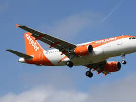 An easyJet aircraft flying at more than 300mph over the Sussex countryside missed a suspected drone by as little as 16ft, an official report has confirmed. Picture by Hollie Adams/Getty Images