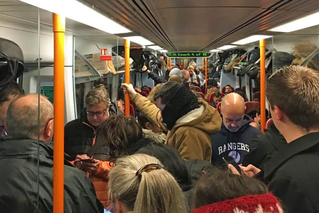 Commuters ride a crowded South Western Railway train on the Portsmouth to London Waterloo line. Picture date: Monday January 8, 2018. Photo: Carey Tompsett/PA Wire