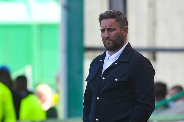 Lee Johnson watches his Hibernian side. 