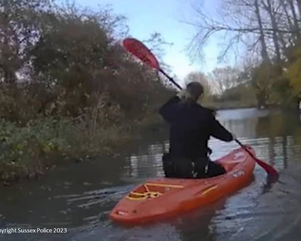 Police kayak to reach a drink-driver whose car got stuck in floodwater 