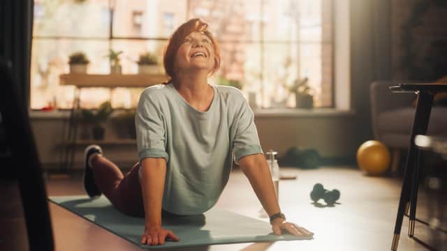 Working out at home can save both time and money (photo: Adobe)