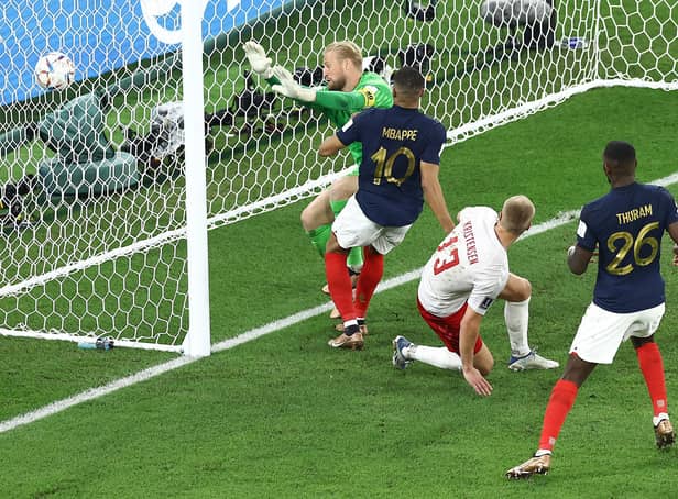 <p>Any body part will do: Kylian Mbappe of France scores the team's second goal past Kasper Schmeichel of Denmark  (Picture: Tim Nwachukwu/Getty Images,)</p>